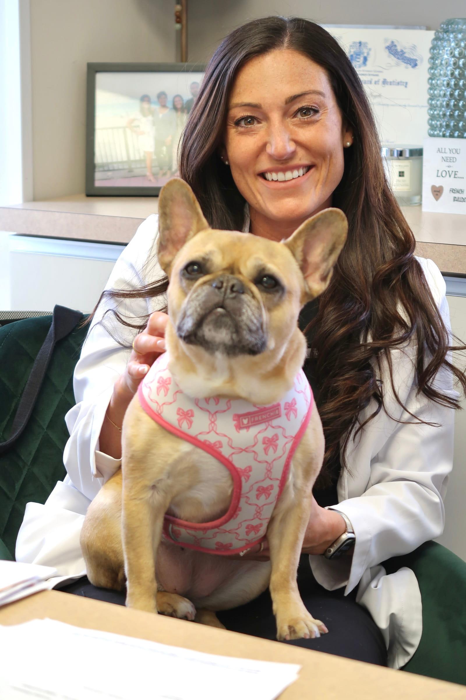 Dr. Angelo with her French bulldog, Mia.